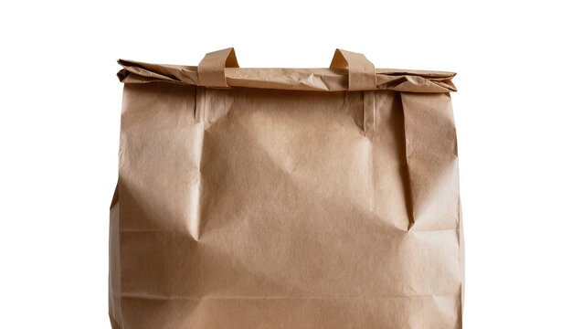 Isolated brown paper bag for shopping delivery takeout or eco-friendly packaging material