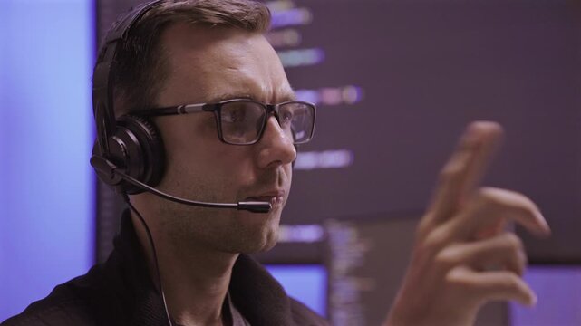 Caucasian male IT support agent talking on online video call