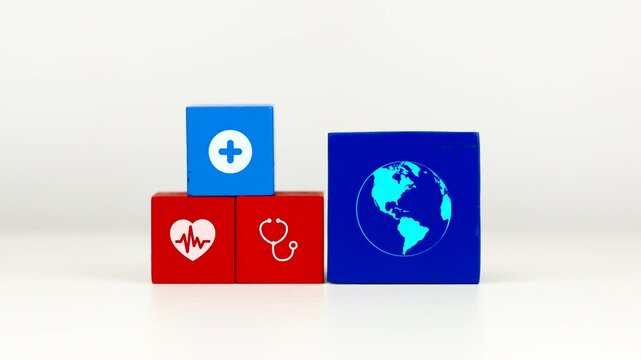 The doctor's hand displays a cube with the Earth icon. Global health and disease prevention concept for World Health Day.