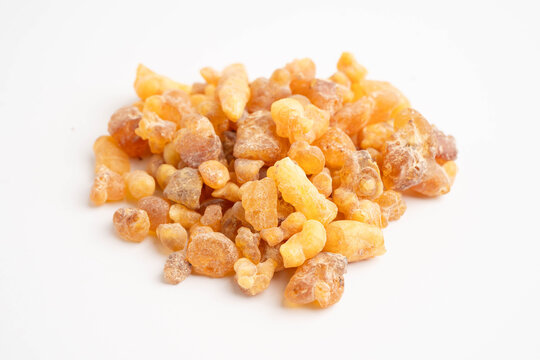 Frankincense or olibanum aromatic resin isolated on white background used in incense and perfumes.