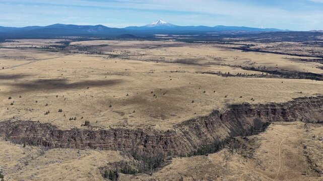 Over millennia Mill Creek has carved a 230-foot deep canyon on the Central Oregon plateau between Bend and Portland. This scenic area of high desert is part of the Warm Springs reservation.