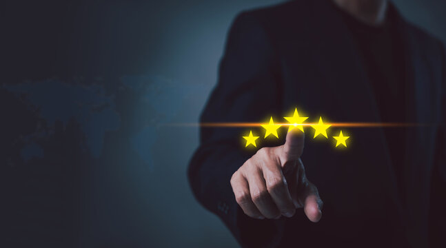 Business professional selecting a five-star rating, representing customer satisfaction, excellent service, positive review, quality assurance, reputation management, client experience, and business.