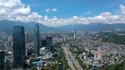 Fototapeta premium Aerial view of a modern cityscape with tall buildings under a blue sky