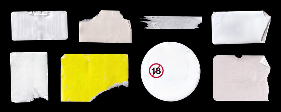 Blank torn stickers and paper labels on black background. Empty labels, crumpled magnetic stickers, price tags and other mockups with peeled edges, or partially torn. Photo mockups high-quality