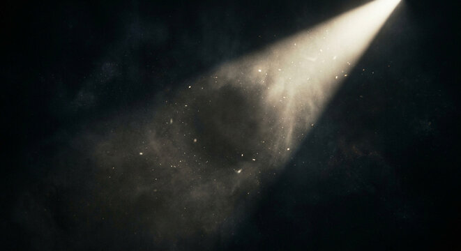 Dramatic single spotlight beam illuminating dust particles in a dark, smoky atmospheric background, ideal for stage or presentation.