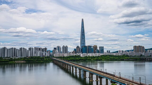 4K time-lapse video of Lotte World in summer, filmed from a bridge over the Han River in Seoul, South Korea.