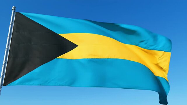 Bahamas flag waving in clear blue sky, national symbol, tropical island nation, aqua, yellow, black colors, patriotic motion footage