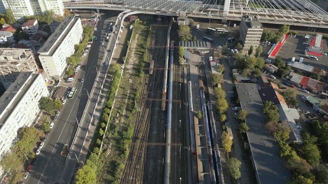 Trains Pass Each Other At Basarab Railway Station Bucharest City Romania Late Afternoon Drone Aerial Shot 4K 60FPS