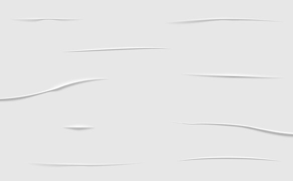 White wrinkled paper texture background with creases and cuts
