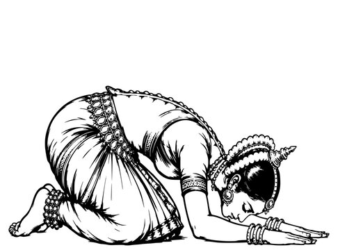 Odissi dancer mid bhumi pranam prostration to earth the spine arcing toward the floor palms flat