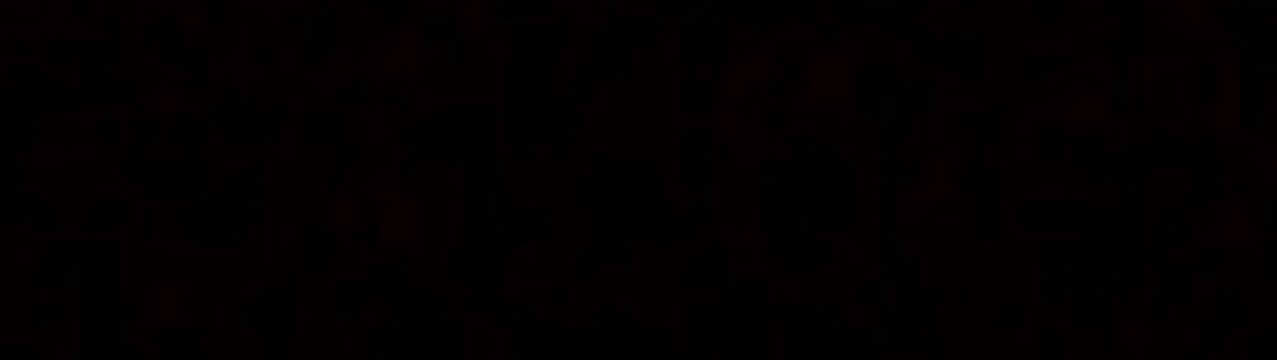 Dark red motion background with subtle organic ripples flowing across deep black void cinematic footage.