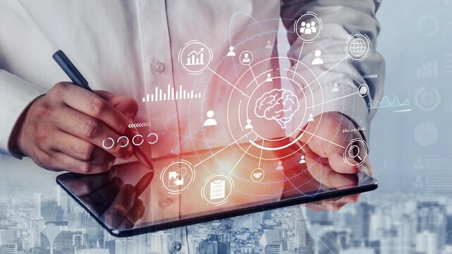 Professional Man Using Tablet for Digital Strategy with Charts, Icons, and Brain Graphic Representing Data Analysis and Technology Concepts in Modern Workspace. Entropy.