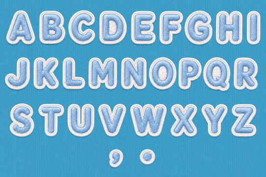 Blue Embroidered Fabric Patch Alphabet Set with Stitched Textile Letters Isolated on Blue Background