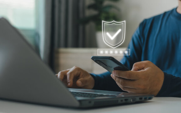 Cybersecurity concept featuring a smartphone, laptop, password protection and security shield icon, representing secure login, data privacy, identity verification, online protection, digital security.