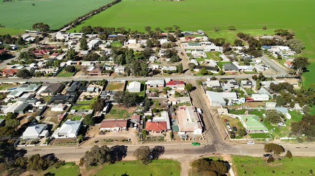 Bute, South Australia &ndash; 4K aerial drone view of rural township, Yorke Peninsula farmland, agricultural landscape, residential houses, grain silos, country roads, Australian countryside.