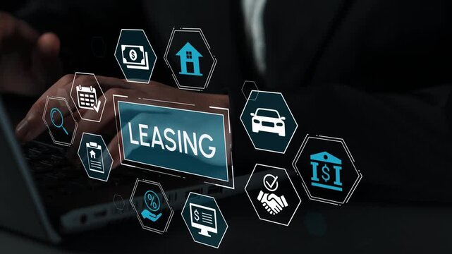 Hands typing on a laptop keyboard with floating icons related to leasing, finance, and real estate, representing modern technology in business transactions. Entropy.