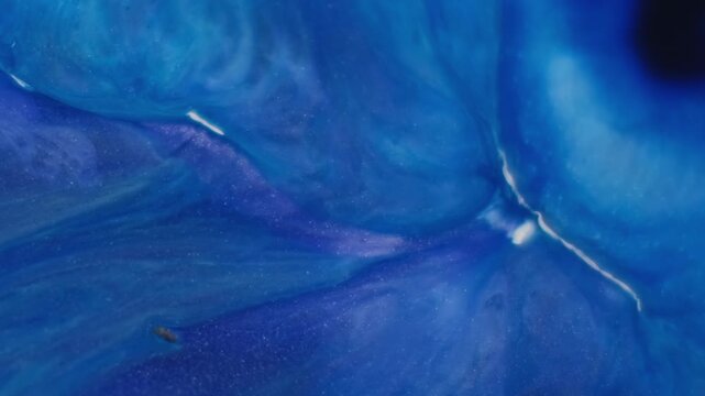 Ink blend. Hypnotic fluid. Blue liquid blotch blur stream swirl floating abstract emulsion background. Dye splatter spread color wave.