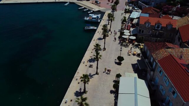 Aerial drone flying over jelsa town in hvar island, croatia