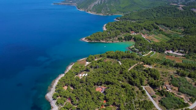 Aerial drone flying over mina beach jelsa in croatia