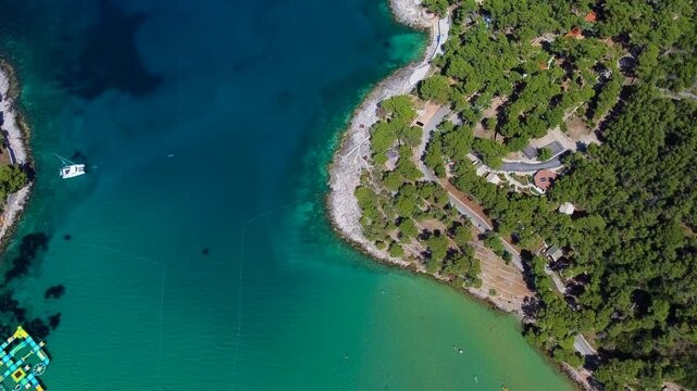 Aerial top view of beautiful turquoise sea at mina beach in jelsa, croatia
