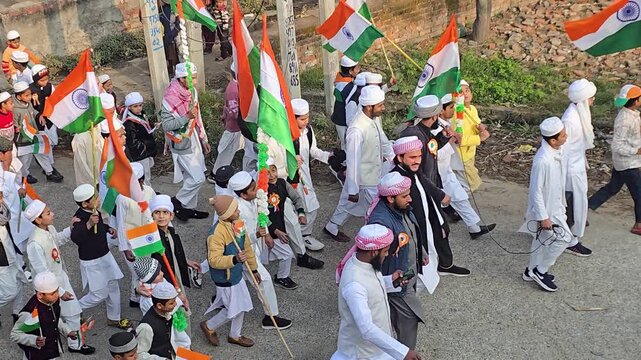 Group of people walking outdoors carrying national flags a of wearing white