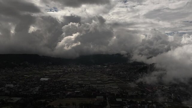 Aerial Timelapse of Dramatic Clouds Rolling Over the Strawberry Fields in La Trinidad, Benguet