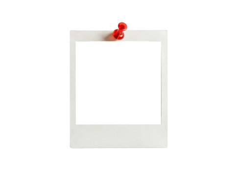 Blank polaroid photo frame with a red push pin