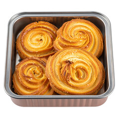 Fototapeta premium Golden Baked Pastries in a Metallic Tray, Swirled and Sugared