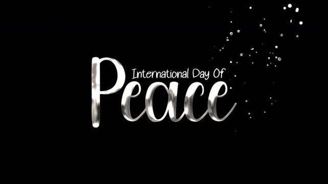 International day of peace white text metallic lettering on black background with glitter sparkles. Suitable for peacerelated designs and promotional materials.