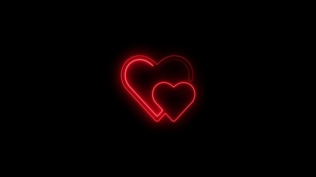 Vivid red neon outline of two nested hearts, a larger heart framing a smaller one, illuminated against a dark black background signifying love and passion