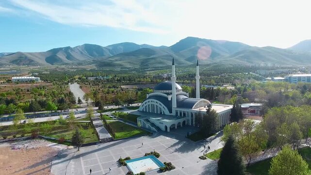 Modern Turkish Campus Mosque and Scenic and peaceful Mountain Landscape in Malatya turkey, aerial Orbit Shot
