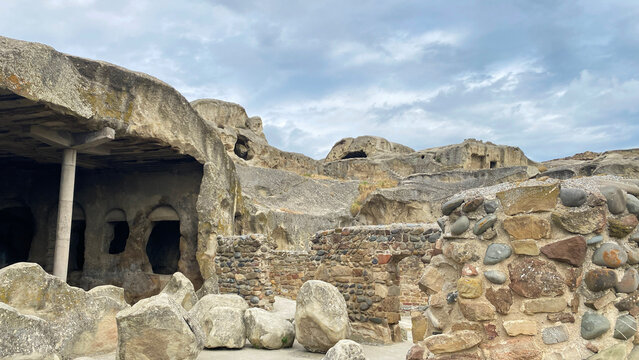 Rock-cut chambers and masonry reveal the architecture of Uplistsikhe, Georgia, where carved interiors meet structural repairs