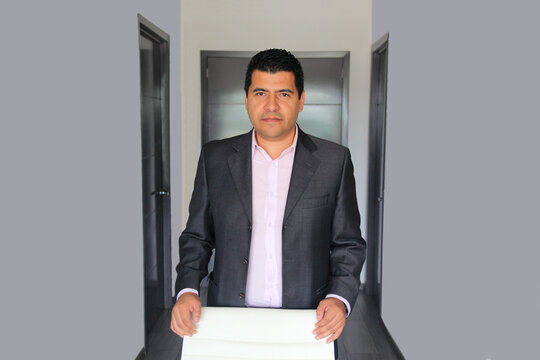 40-year-old Latino executive with a dark skin, successful leader of his business and finance venture