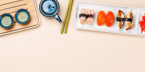 Sushi set with tea and small teapot © Evgeny Karandaev