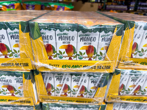 Sunberry Organic Mango Nectar Cases On Store Display