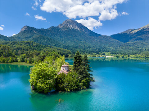 Aerial view of Lake Doxa with Agios (saint) Fanourios chapel in Peloponnese, Greece