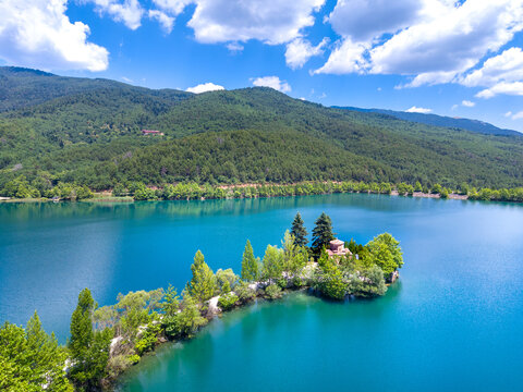Aerial view of Lake Doxa with Agios (saint) Fanourios chapel in Peloponnese, Greece