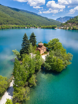 Aerial view of Lake Doxa with Agios (saint) Fanourios chapel in Peloponnese, Greece