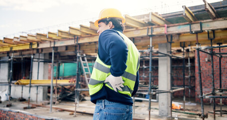 Fototapeta premium Back pain, stress and man on construction site with injury, muscle fatigue and tension. Contractor, engineer and person with sprain, fibromyalgia and pressure for burnout, posture strain and accident