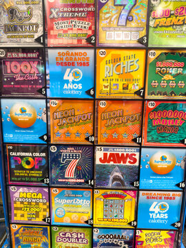 Vintage Pull Tab Lottery Games In Colorful Display Rack