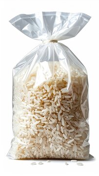 A clear plastic bag filled with uncooked white rice, tied at the top