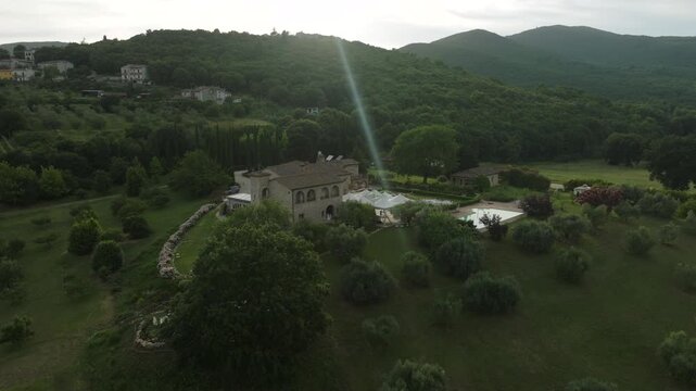 Aerial Sunrise Over Amelia Italy Near Umbria Quiet Countryside Village With Rolling Hills, Farmland and Morning Light