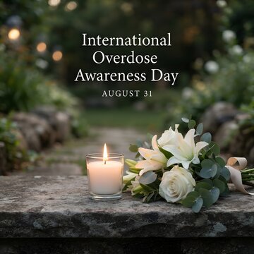 International overdose awareness day design with a memorial candle and white flowers