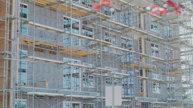 Scaffolding framework on residential apartment building under construction