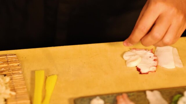 Professional Sushi Chef Preparing Fresh Sashimi Platter in Bangkok Restaurant