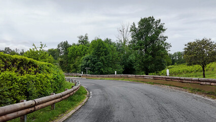 Obraz premium Winding Rural Road Through Vineyards in Saint-Emilion France