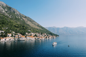 Fototapeta premium Scenic coastal village and mountains in Kotor Bay Montenegro
