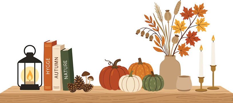 Autumn shelf decor with pumpkins, books, and flowers