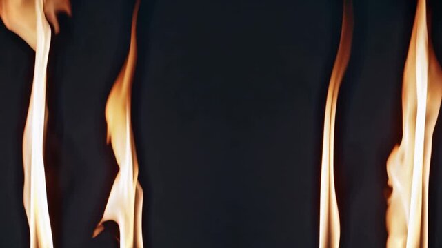 Flames flickering and dancing against a dark background, showcasing a continuous flow of fire in three distinct stages of movement and shape transformation