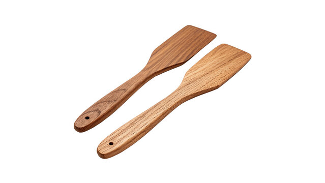 Pair of simple natural brown wooden cooking spatulas isolated on transparent background